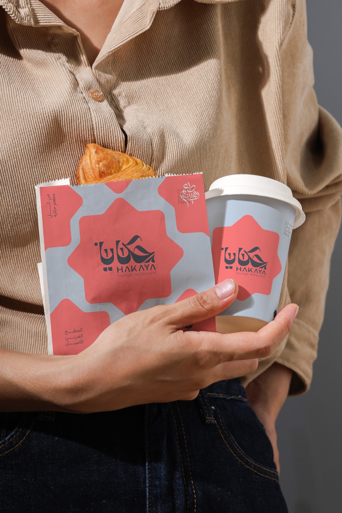 HAKAYA — takeaway bag and cup, lifestyle shot