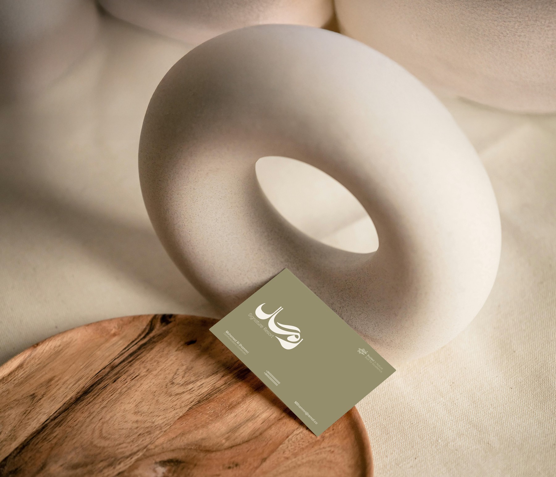Remal Resort — business card with ceramic vase